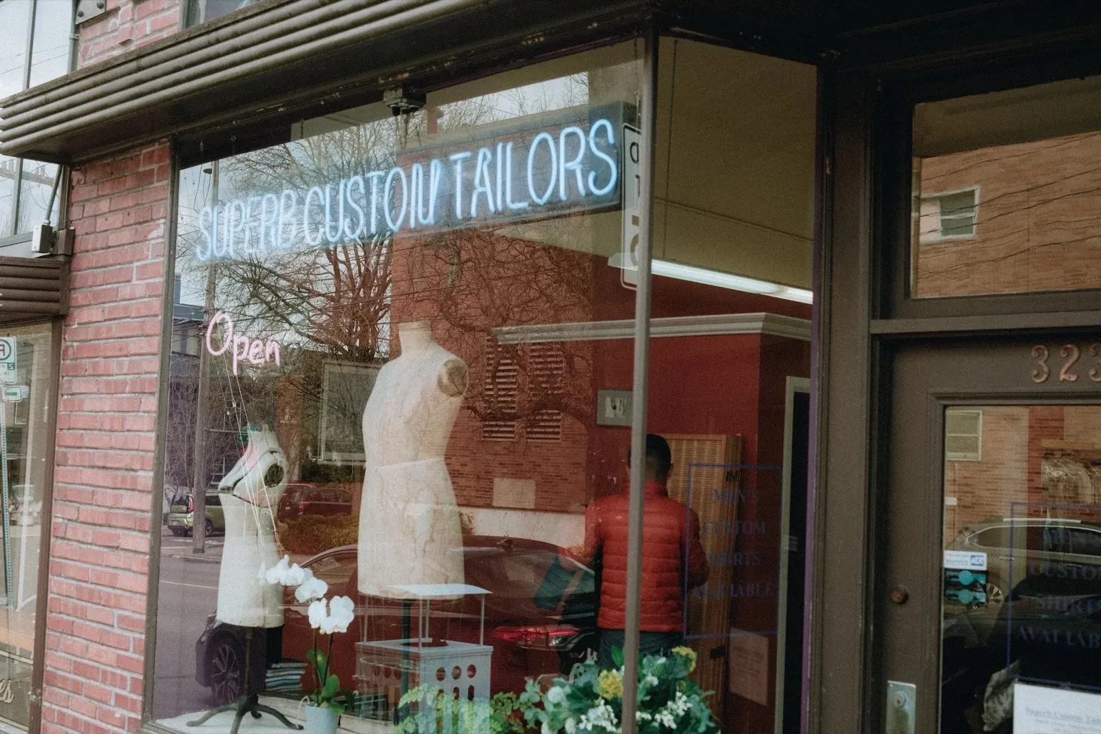 The Superb Custom Tailors storefront on W Galer St in Seattle